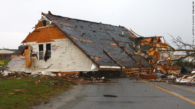 The roof of a building sits in the middle of the road in Kokomo, Indiana, on November 17. 