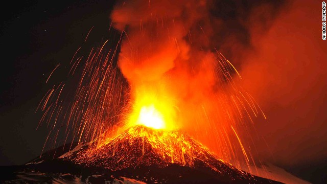 Mount Etna, as seen from the town of Acireale, Italy, spews lava during an eruption on November 16.