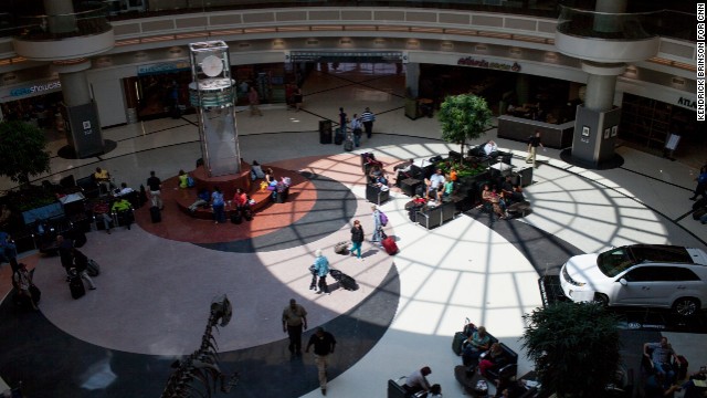 People pass through the Domestic Terminal atrium.