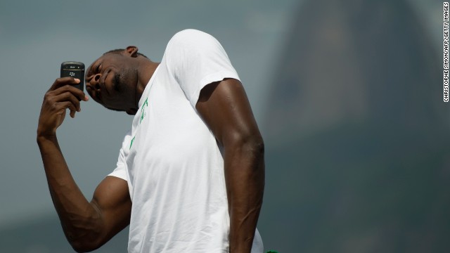 Track star Usain Bolt takes a picture of himself under the Christ the Redeemer statue in Rio de Janeiro. Oxford defines a selfie as "a photograph that one has taken of oneself, typically one taken with a smartphone or webcam and uploaded to a social media website."