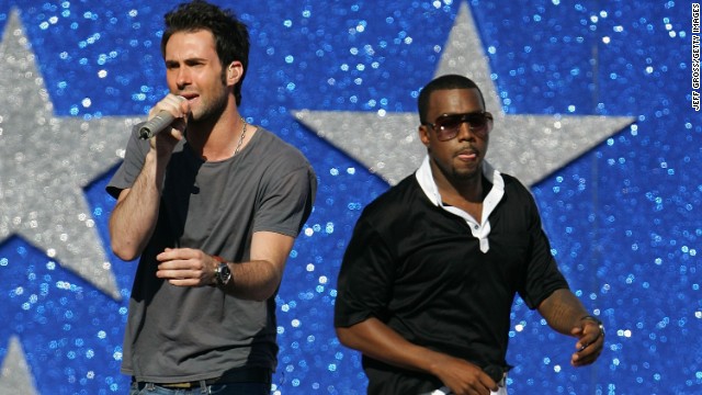 Levine sings with Kanye West in Los Angeles in 2005.