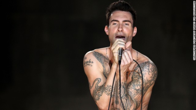 Levine sings during the Maroon 5 video shoot for their song "Moves Like Jagger" in Los Angeles in 2011.