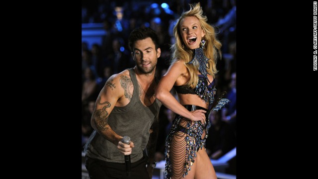 Levine performs with model Anne Vyalitsina during the 2011 Victoria's Secret fashion show in New York City.