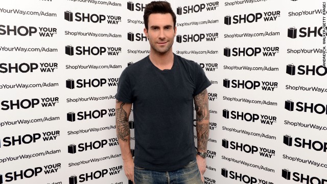 <a href='http://www.cnn.com/2013/11/19/showbiz/sexiest-man-alive-levine/index.html'>People magazine has named Adam Levine of the band Maroon 5 its "Sexiest Man Alive."</a> Above, Levine kicks off his collection for ShopYourWay.com on February 21 in New York City. People is published by Time Warner, which is also the parent company of CNN.