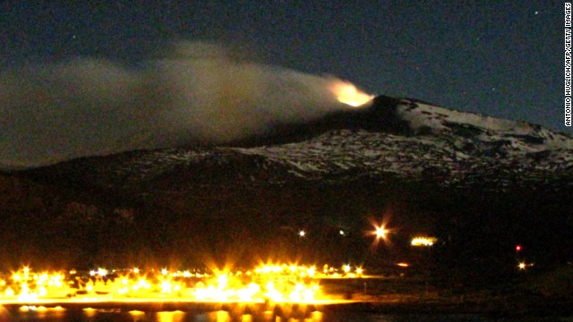 The Copahue volcano emits smoke and she above Caviahue, in Neuquen province of Argentina on December 24, 2012.