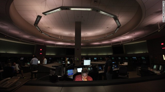 Inside the Federal Aviation Administration's Terminal Radar Approach Control, or TRACON, Ken Hunihan monitors the systems that air traffic controllers use, including radar antennas and communication towers.