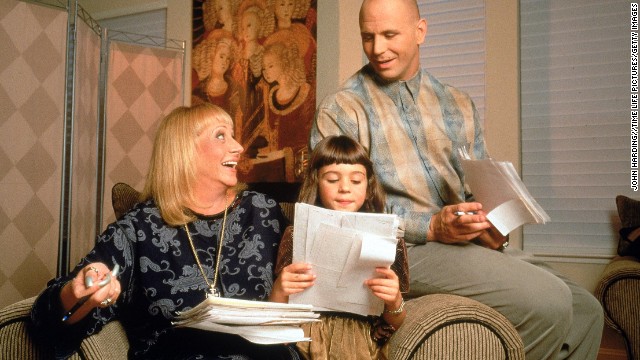 Renowned psychic Sylvia Browne, a leader in the paranormal world who appeared regularly on television and radio and also wrote dozens of top-selling books, died November 20 in a northern California hospital, according to her website. She is pictured here with her granddaughter Angelia and son Christopher.