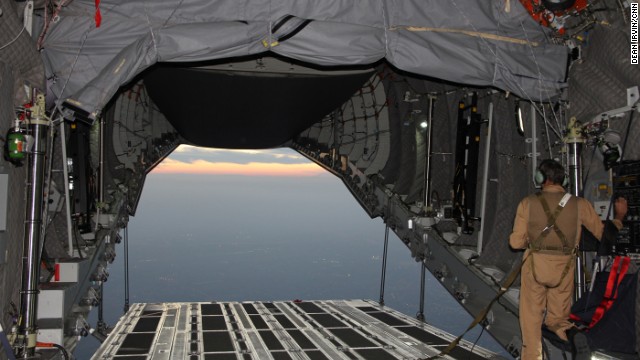 With the payload doors open flying around 12,000 feet above the United Arab Emirates.