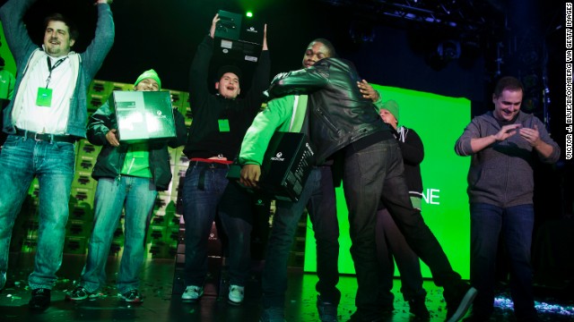 Fans cheer the release of Xbox One at a Microsoft launch event early Friday in New York.