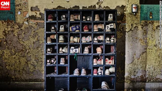 For "States of Decay," the photographers traveled through America's Rust Belt, a geographic term used to describe the economic decline of America's industrial heartland. They found a rack of forgotten bowling shoes in an old asylum in New York.