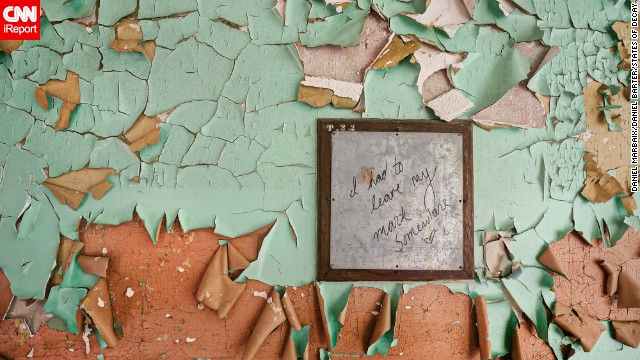 "I had to leave my mark somewhere" says this note found on a wall in a New Jersey asylum.