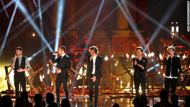 Zayn Malik (from left), Liam Payne, Harry Styles, Louis Tomlinson and Niall Horan of the boy band One Direction perform.