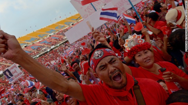 Thai pro-government 'red shirts' gathered at a football stadium to counter the growing anti-government protests and to show support for Prime Minister Yingluck Shinawatra's crisis-hit administration.