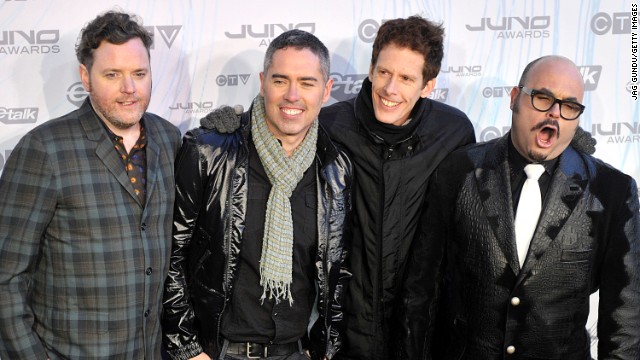 Kevin Hearn, Ed Robertson, Jim Creeggan and Tyler Stewart of Barenaked Ladies pose on the red carpet at the 2011 Juno Awards at the Air Canada Centre in 2011 in Toronto, Canada. 