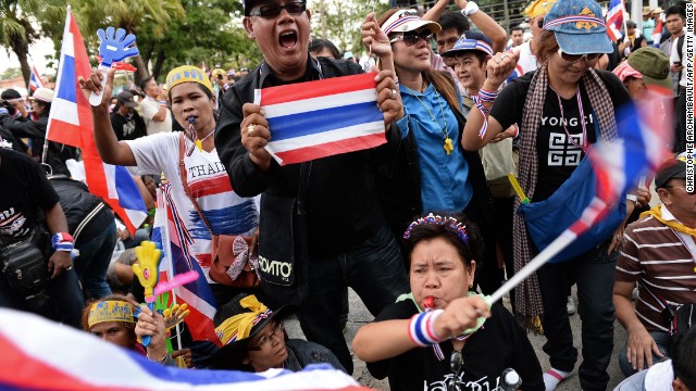 Thailand's mass political protests spread outside the capital on Wednesday as opposition demonstrators stepped up their attempts to overthrow Prime Minister Yingluck Shinawatra's government, plunging the country deeper into crisis.