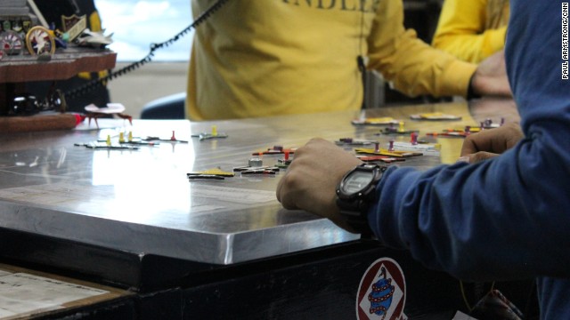 Like any airport, floating or not, aircraft have to be organized and controlled -- it's a very busy flight deck with take offs and landings every few minutes.