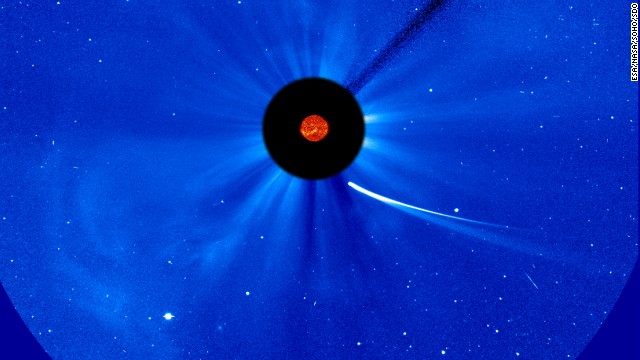 Comet ISON's position is seen near the sun at 9:30 a.m. ET on November 28. This composite image comes from NASA and the European Space Agency.