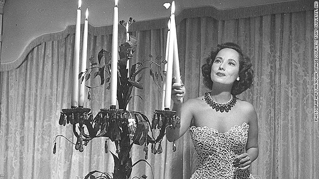 Holywood actress Merle Oberon, pictured here at her home in the 1950s, commissioned a valuable Cartier necklace that she is wearing in the picture, in 1938. 