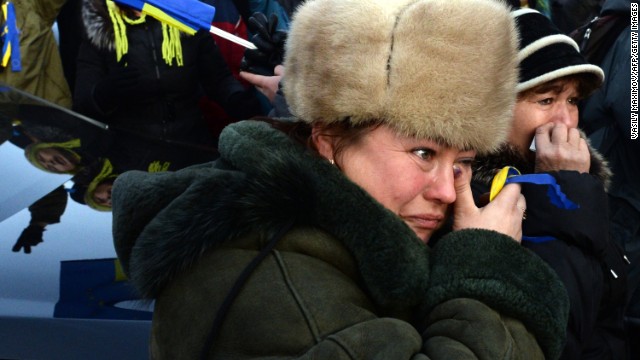 A woman cries during a rally on November 30.