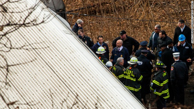 Cuomo inspects the damage along with emergency crews.