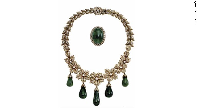 Jacqueline Onassis' Van Cleef and Arpels necklace and brooch. Much of the emerald's allure comes from its color - in normal lighting the human eye responds most strongly to yellowish-green light. 