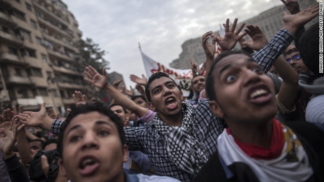 Students backing Mohamed Morsi shout slogans during a demonstration on December 1, in Cairo.
