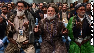 Members of the Afghan loya jirga, a meeting of around 2,500 tribal elders, pray on the last day of the four-day meeting.n