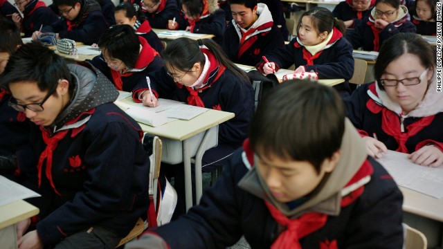 Students attend class at the Jing'an Education College Affiliated School in Shanghai. The Chinese city of 23 million people topped PISA's 2012 study, performing at a level at least one year more advanced than the average 15-year-old in math, science and reading.