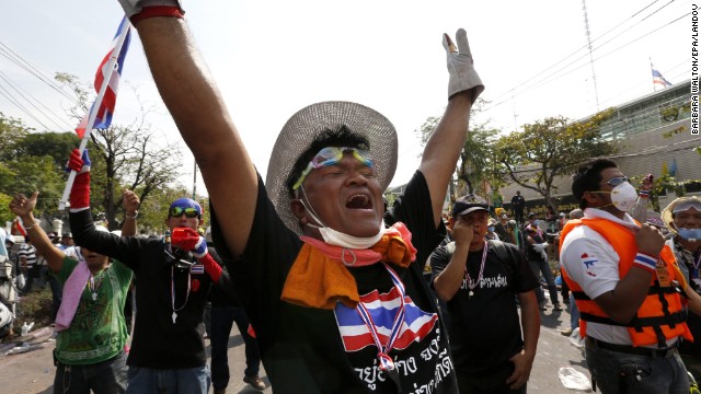 Protesters celebrate on December 3 after news that the government backed down.