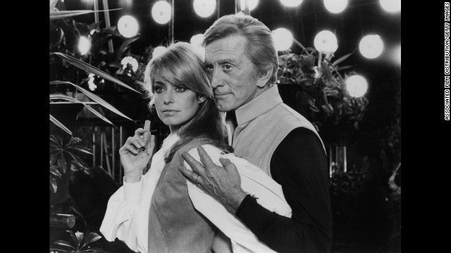 Fawcett is held by Kirk Douglas in a scene from the film "Saturn 3" in 1980. 