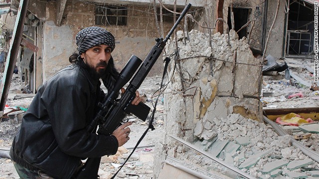 A rebel fighter from the Free Syrian Army holds a position at a front line in the Salah al-Din neighbourhood of the northern Syrian city of Aleppo, on December 1, 2013. The stricken nation dropped nine points from 144th place to 168th in the index.