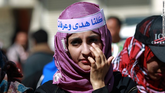 A Yemeni girl takes part in a gathering in support with Saudi young woman Huda al-Niran outside the courthouse during her trial on November 24, 2013 in the capital Sanaa. Niran, 22, was arrested and sued after she fled from Saudi Arabia to Yemen with a Yemeni man after her family refused to let them marry, her lawyer told Human Rights Watch.