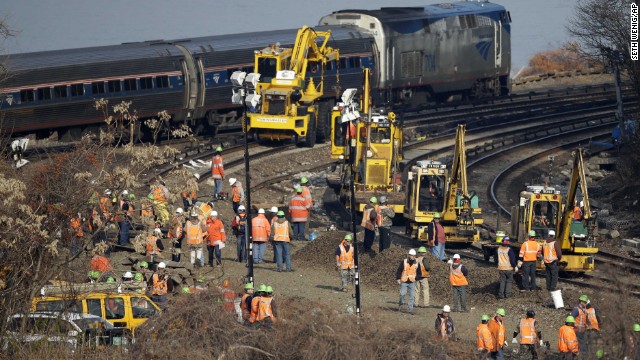 Repair efforts are under way Tuesday, December 3, at the site of a recent train derailment in the Bronx. At least four people were killed and more than 60 people were injured after a Metro-North passenger train derailed Sunday, December 1, about 10 miles north of Manhattan's Grand Central Terminal.