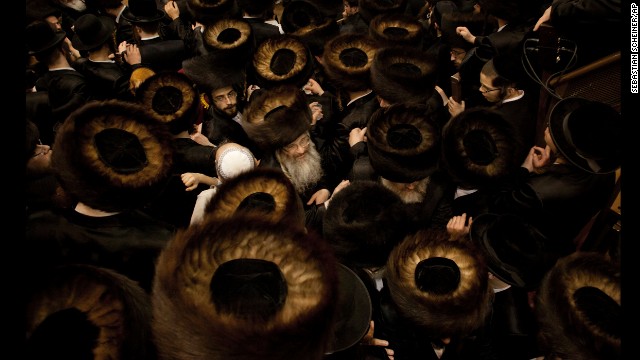 <strong>February 25:</strong> Ultra-Orthodox Jewish men gather at a yeshiva in Jerusalem during the Purim holiday.