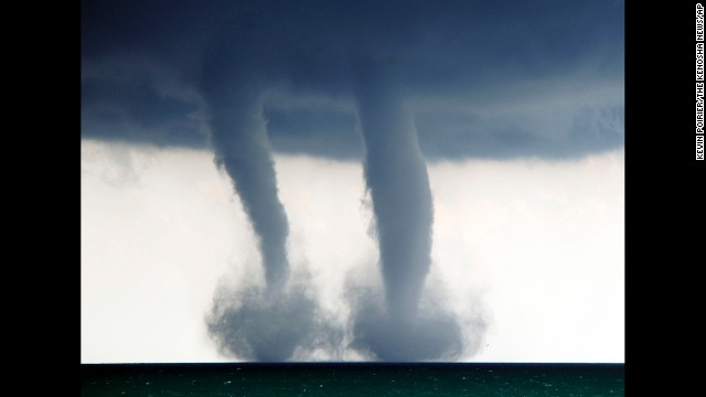 <strong>September 12:</strong> A pair of waterspouts form on Lake Michigan, southeast of Kenosha, Wisconsin.