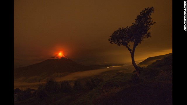 <strong>May 8:</strong> The Tungurahua volcano is seen from the village of Cotalo, Ecuador. Tungurahua keeps generating explosions and expelling incandescent boulders that roll down its flanks.