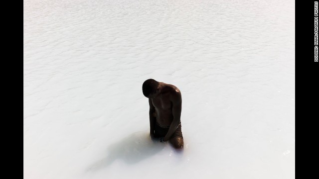 <strong>April 30:</strong> A drilling worker takes a break in an unfinished geothermal pool next to the Kenya Electricity Generating Company's two active geothermal plants. Kenya was the first African country to build geothermal energy sources.