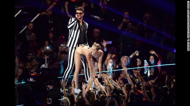 <strong>August 25:</strong> Robin Thicke and Miley Cyrus perform on stage during the MTV Video Music Awards in New York. The provocative performance dominated the headlines and had many people discussing whether it was too risque.