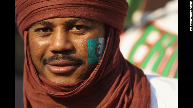 The World Cup brings 32 nations together to compete in the "beautiful game," and each country's fans are just as boisterous as the last. Click through to see fans from all of the 32 countries that will be competing in this year's soccer tournament in Brazil. Above, an Algeria supporter.