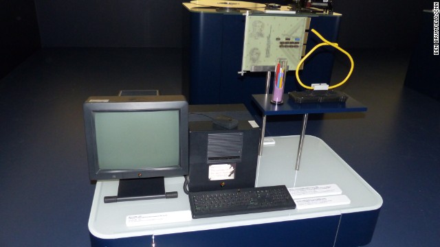 One of the world's first web servers, a NeXT computer from 1991, is seen at CERN. The handwritten note indicates, "This machine is a server. DO NOT POWER DOWN!" On the right is an old Ethernet cable, which can handle only 10 Mb/second, and was largely replaced by the mid-'90s. 