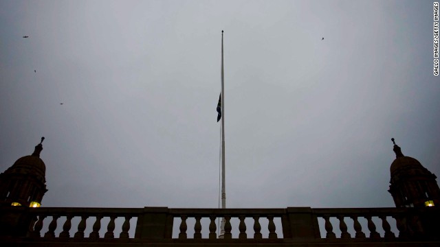 The South African flag is flown at half-staff at the Union Buildings on December 6 in Pretoria, South Africa.