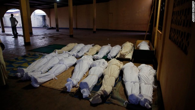 Shrouded bodies are seen in a Bangui mosque December 5.