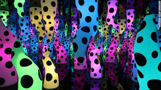 In<i> Love is Calling</i>, the mirrored room is illuminated by inflatable, tentacle-like forms. Polka-dots have been an obsession for Kusama for as long as she has been an artist. They are plastered across her paintings, on her clothes, and incorporated into her infinity rooms.