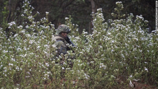 A French soldier watches the road in Baoro on Saturday, December 7. 