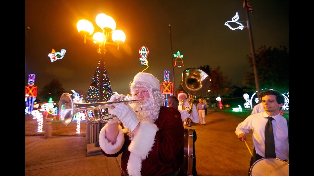 Doyle Cooper of the Red Hot Brass Band participates in the "Lights Up The Holidays" gala at Lafreniere Park in Metairie, Louisiana, on December 5.