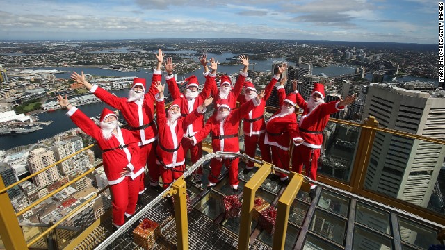 Santas visit the Skywalk at Sydney Tower on December 2 in Sydney.