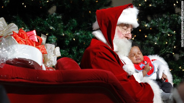 Santa and 2-month-old Ty'e Fishe have their picture taken November 29 at Lakeside Mall in Metairie, Louisiana. 