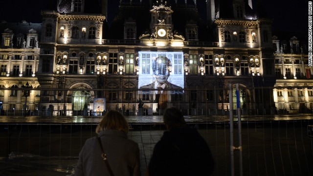 A portrait of Mandela is projected onto city hall in Paris on December 8.
