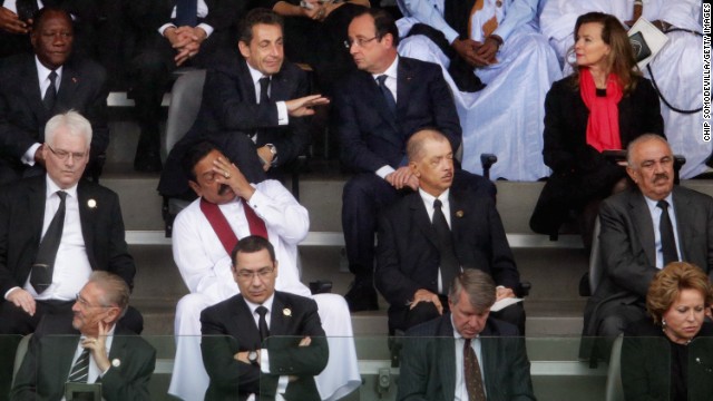 World leaders, including former French President Nicolas Sarkozy, top second left, and French President Francois Hollande, top second right, attend the memorial service.