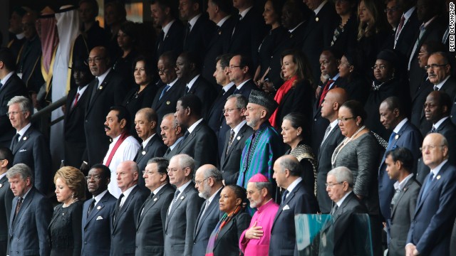 Dignitaries from all over the world stand at the beginning of the memorial service.